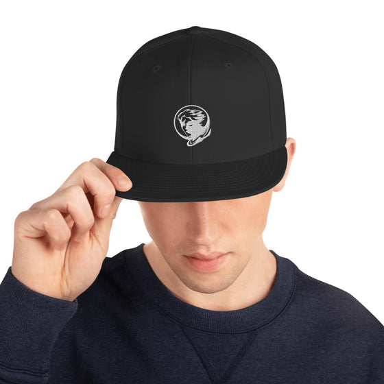 Black baseball hat with logo of a man's face behind the moon