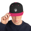 Black baseball hat with logo of a man's face behind the moon