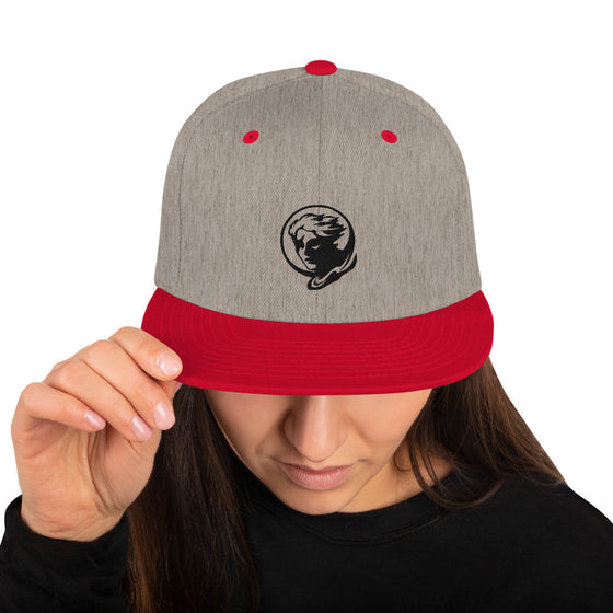 Gray baseball hat with logo of a man's face behind the moon