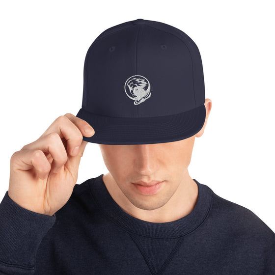 Blue baseball hat with logo of a man's face behind the moon