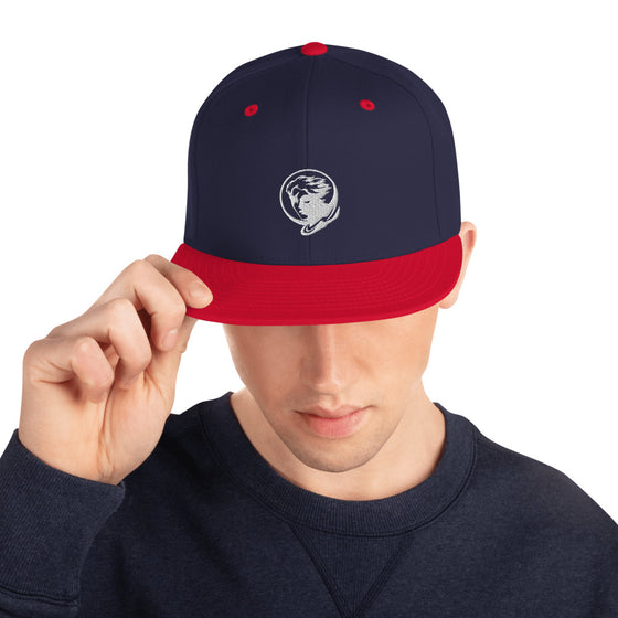 Blue baseball hat with logo of a man's face behind the moon