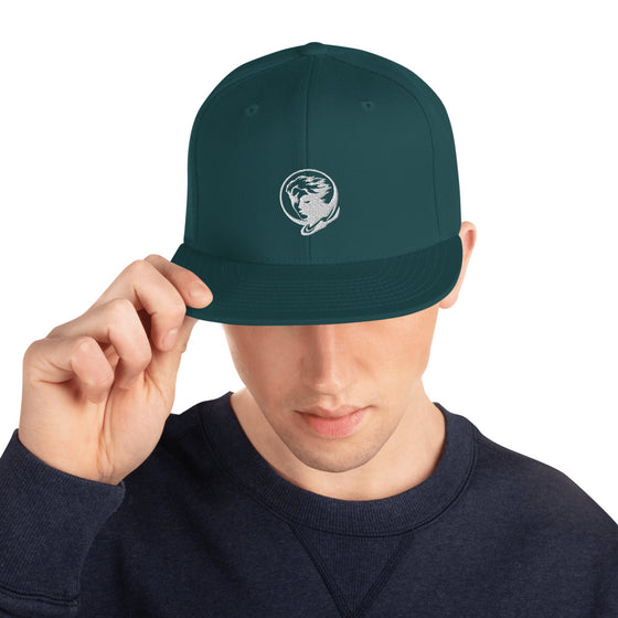 Green baseball hat with logo of a man's face behind the moon