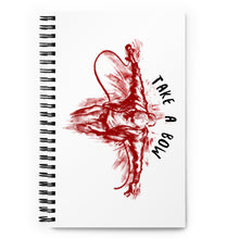  White notebook with red colored graphic of rapper taking a bow after a performance. Overarching title says TAKE A BOW.