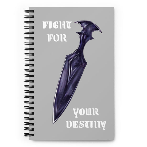 Grey notebook with a mystical obsidian dagger. White text says FIGHT FOR YOUR DESTINY.