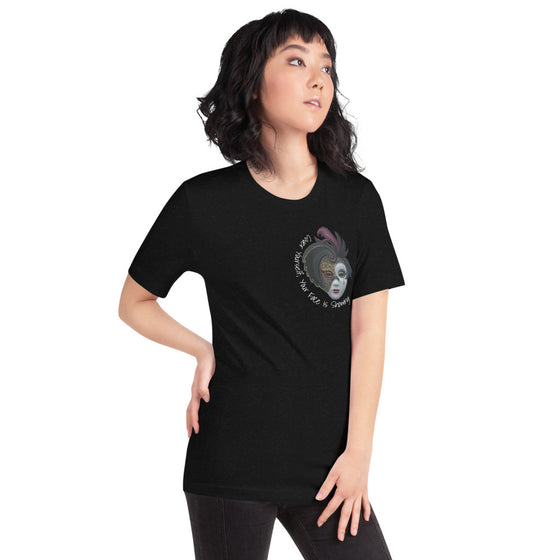 Black graphic shirt of a masquerade mask with the text YOUR FACE IS SHOWING